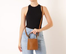 Bolsa Bucket Média Alça Acrílica Onça Marrom