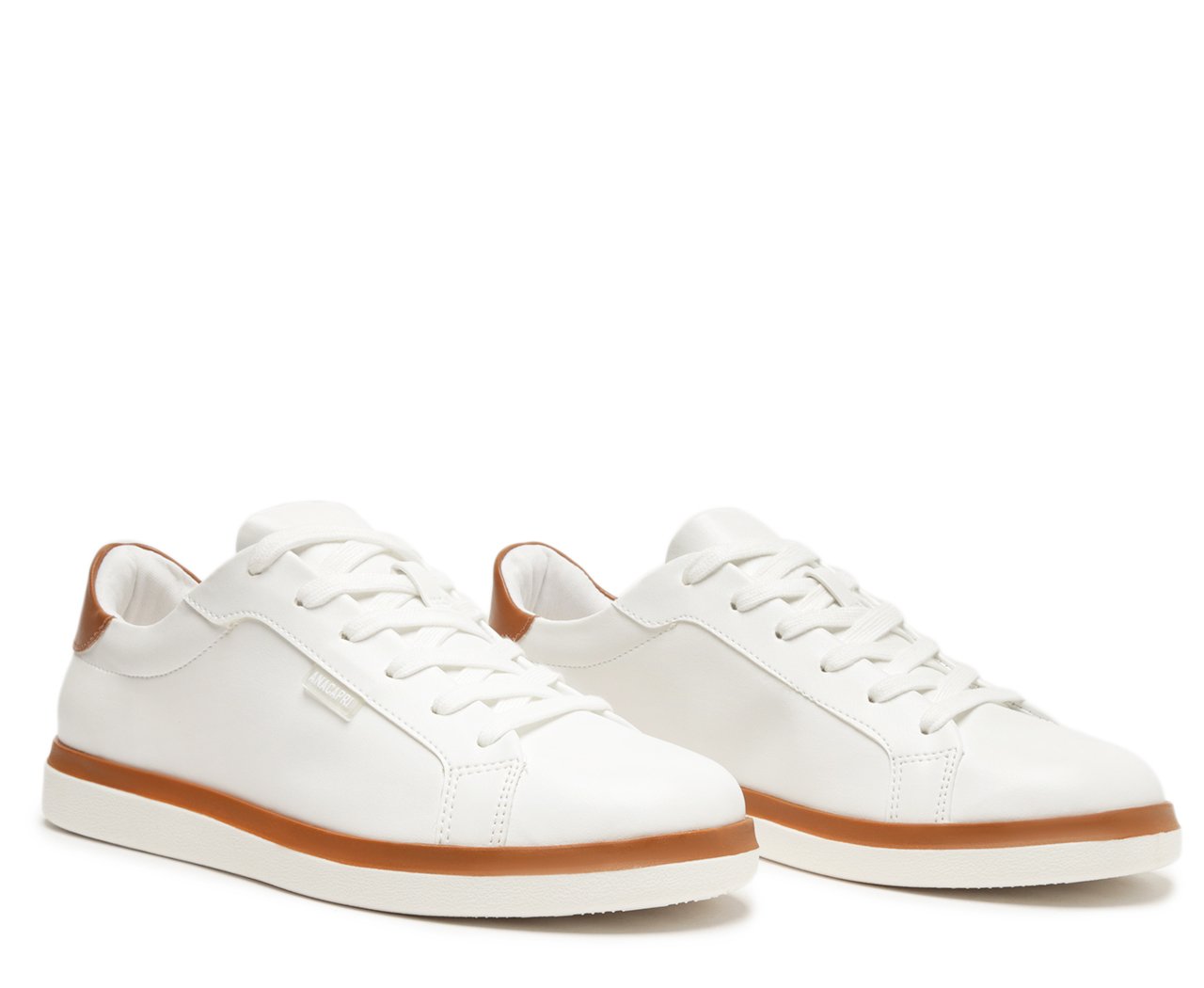 Tenis branco solado sales marrom