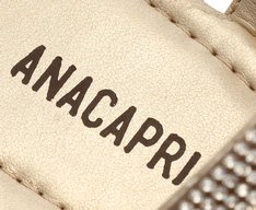 Rasteira Brilhosa Tira Curva Dourada